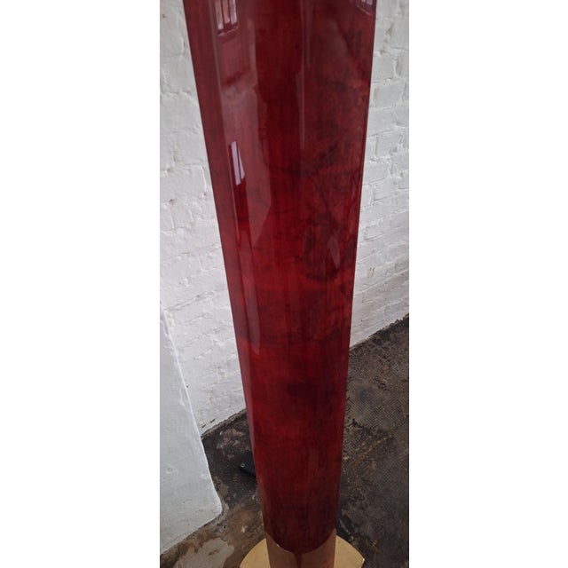 Rare Italian floor lamp by Aldo Tura with a mottled parchment acrylic lacquered finish, solid brass base, and shade. The...