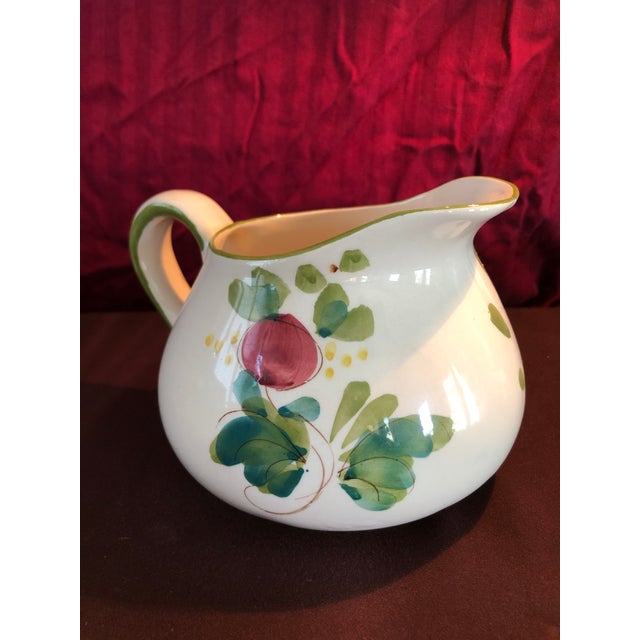 A charming Portuguese vintage ceramic pitcher.