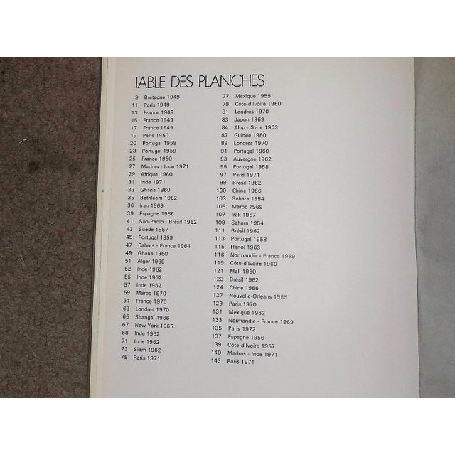 Each of these mid century photographs by famed photographer Edouard Boubat (Fr. 1923-1999) depicts people in everyday...