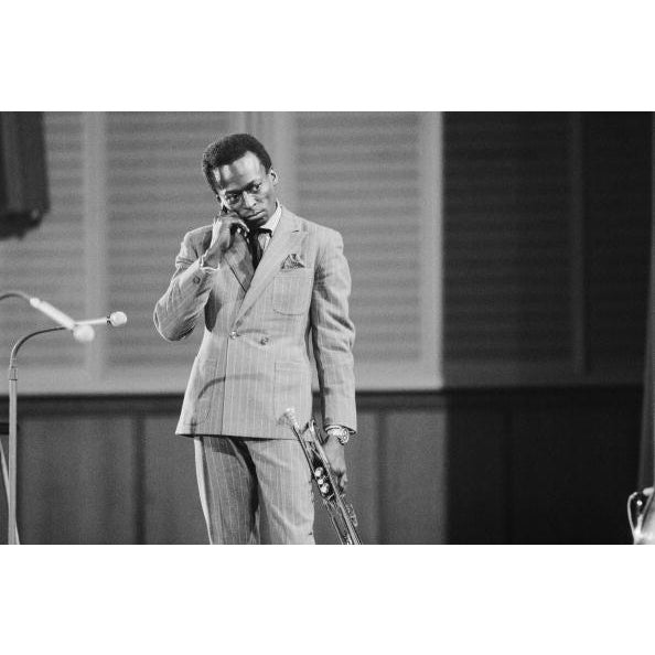 Miles In Germany Jazz trumpeter and composer Miles Davis plays trumpet as he performs onstage in circa 1959 in West...