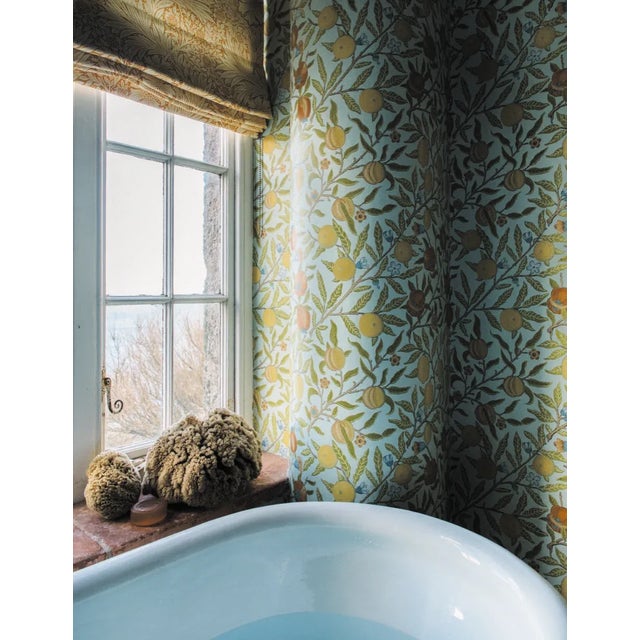 An iconic design from 1864 Fruit is one of Morris‚Äôs earliest wallpapers. Depicting flowing branches laden with ripe...