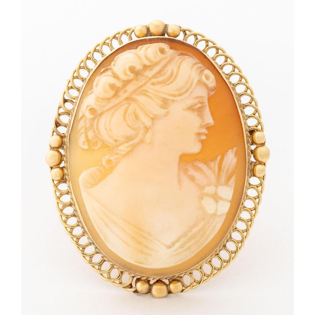 Portrait of a Lady Carved Cameo 14K Yellow Gold Brooch Pendant, featuring one bezel set carved cameo framed in 14K yellow...