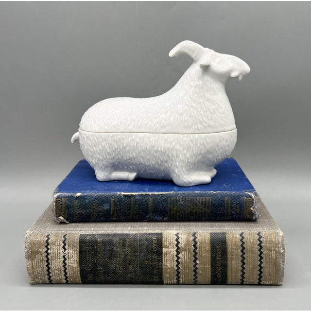 Exquisite white trinket or butter dish made by luxury porcelain maker Mottahedeh Co. Maker's stickers are on the...