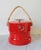 Vintage red nautical themed ice bucket with rope handle, anchor, and ship helm. Made in the USA by Shelton Ware. Some age...