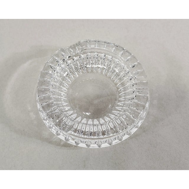 Round vintage crystal ashtray with beautiful faceted detail around its base. Overall great condition, tiny chips...