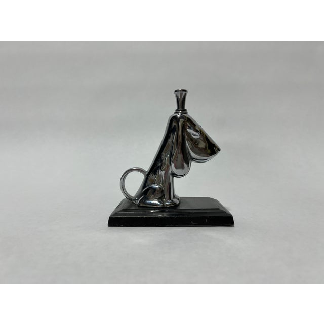Charming Ronson Striker lighter from 1935, designed in the form of a Basset Hound. This collectible piece combines the...
