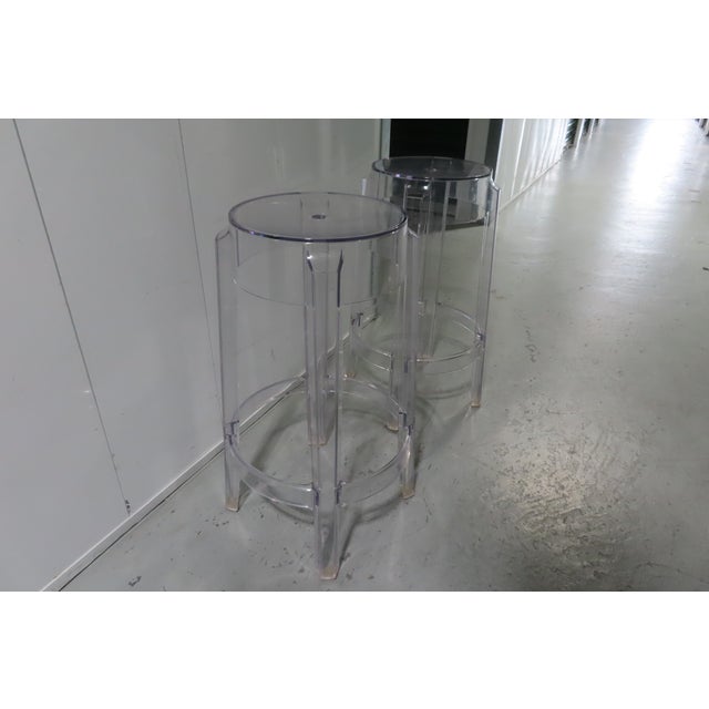 Two fantastic Charles Ghost stools by Kartell in clear transparent color palette. The stools are in great condition, there...