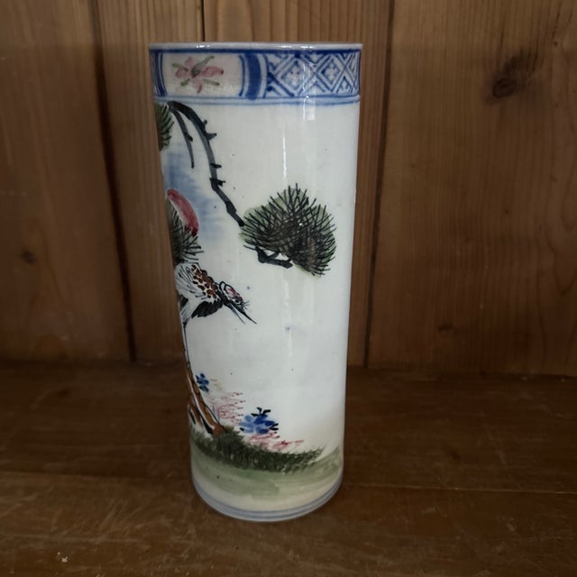 9 inches tall x 3.5 inches wide cylindrical vase. Republic period hand painted ceramic natural scene.
