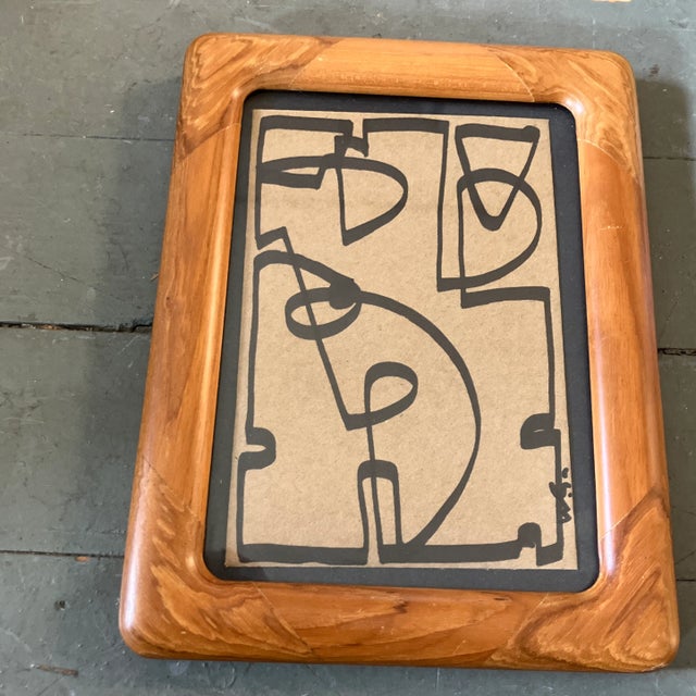 Original 4 x 6 marker drawing on brown paper signed bottom right Laid down on black paper Overall size with vintage wood...