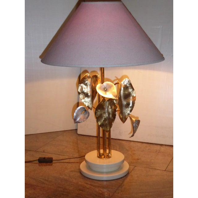 This table lamp by Lanciotto Galeotti who set up L'Originale in the 1970s near Firenze, Italy. The lamp has a white...