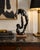 This striking contemporary abstract face sculpture presents a captivating profile that transforms from every viewing...