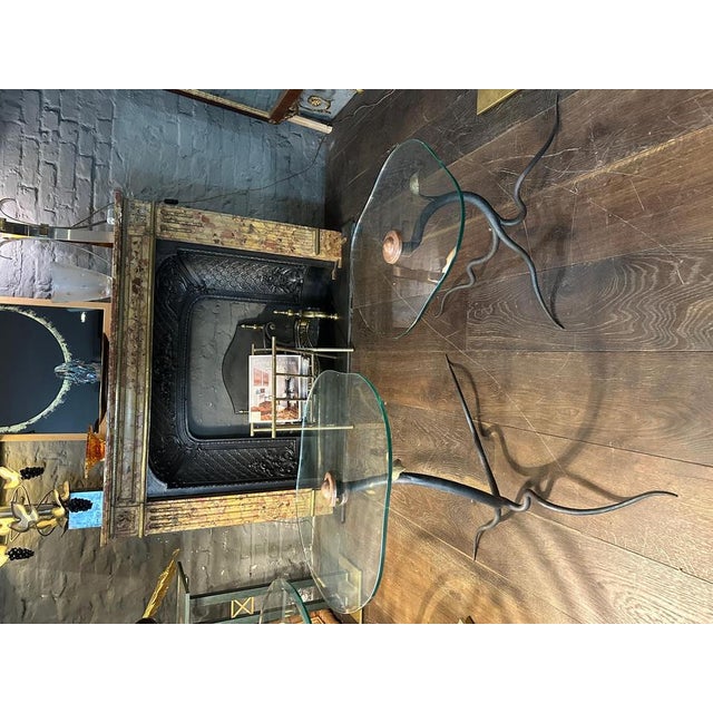 Made by Dutch design firm DAD Rotterdam, no longer in existence. Organic wrought iron base with gold gilt leaf shaped...