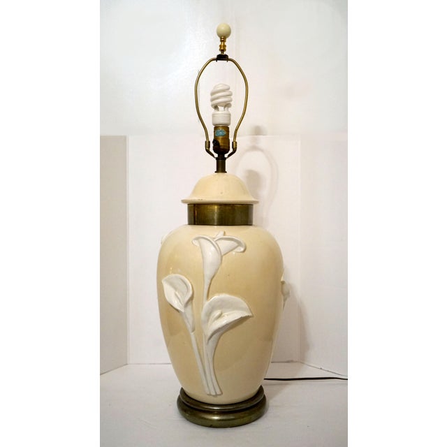 This is a beautiful Chapman ceramic lamp with brass base from 1979 .The sculptural raised Calla Lillies are in perfect...