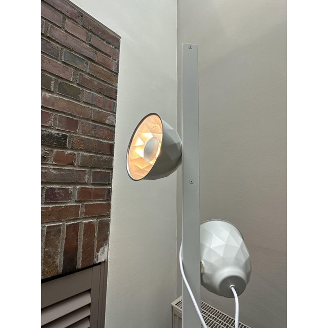 Tripod Floor Lamp by Normal Studio for Ligne Roset, 2012, in Very Good conditions. Designed from 2000 This piece has an...