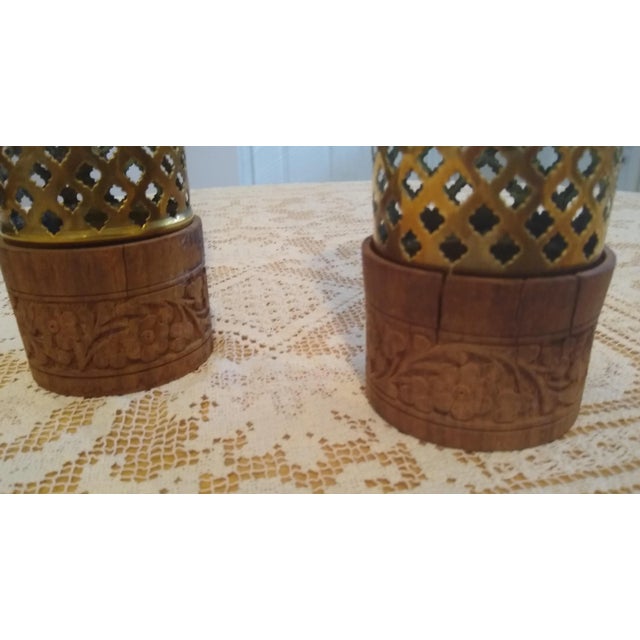 Acquired while living in Singapore in the early 1980s. They're tall candleholders that diffuse light through the diamond-...