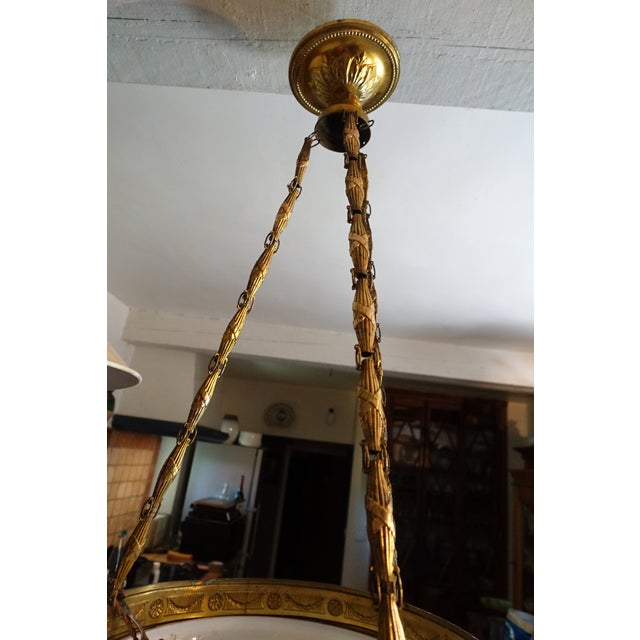 Beautiful Art Deco pendant light, signed painted glass with marbled patterns in various colors hemisphere brass frame...