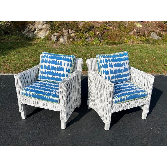 Pair of High end White Wicker Club Chairs with custom covered cushions in Schumacher Queen of Spain upholstery. . Perfect...