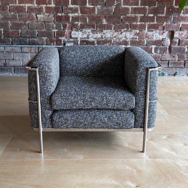 Designed by Jack Cartwright, these LC2 chairs have been brought back to life with fresh black and white woven Crypton...