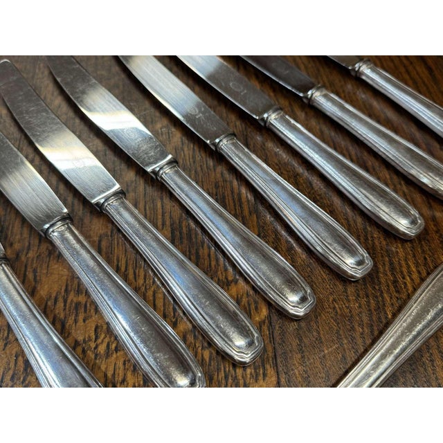 Set of 12 large silver-plated metal knives - Stainless steel blade and silver-plated metal handle - L=25cm, W=2cm.