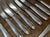 Set of 12 large silver-plated metal knives - Stainless steel blade and silver-plated metal handle - L=25cm, W=2cm.