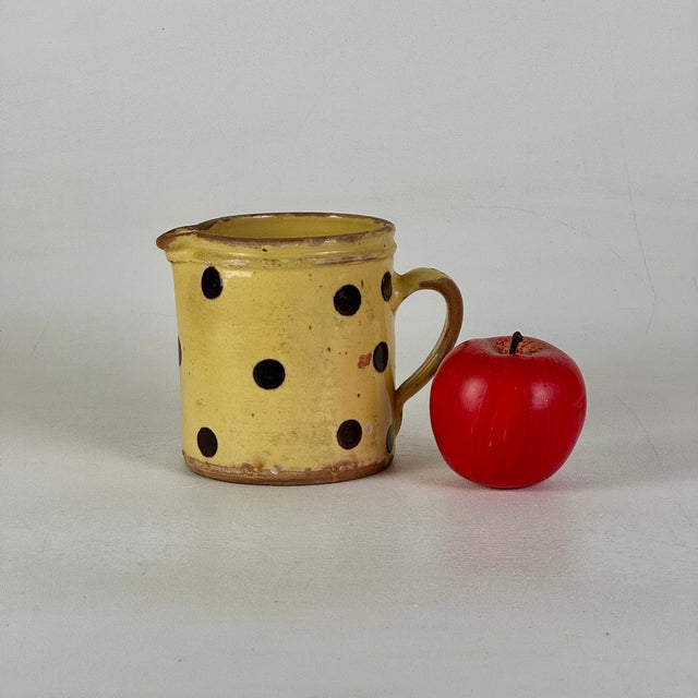 One of a selection of 19th Century French handmade, painted, and glazed pitchers we have in the store. This is the medium...