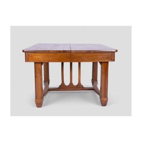 This charming vintage table is a unique piece that will add a touch of rustic elegance to any space. Made of light brown...