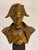 A handsome 19th-century bronze bust of Napoleon Bonaparte, depicted in his iconic bicorne hat and military uniform. The...