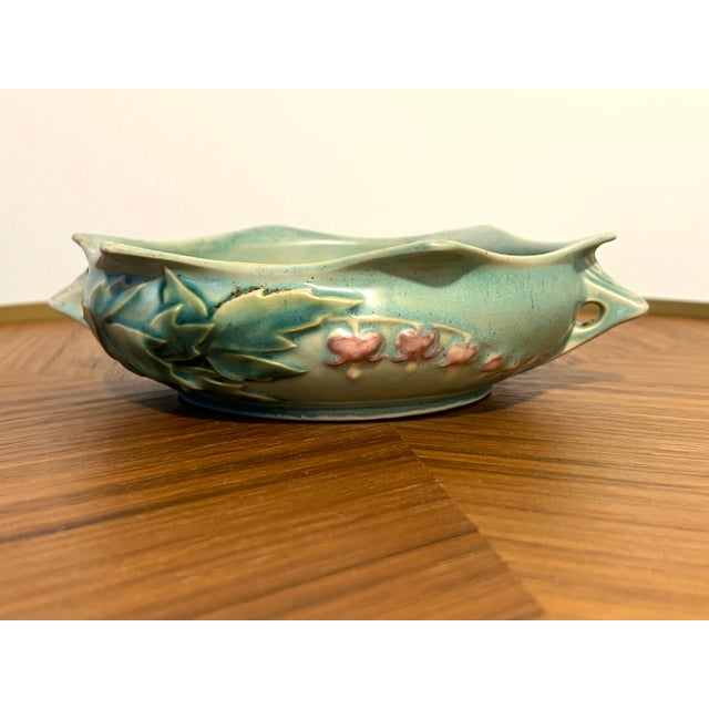 This is a beautiful example of a Roseville pottery Bleeding Heart pattern, shape 379–6 produced in the early 1940s. The...