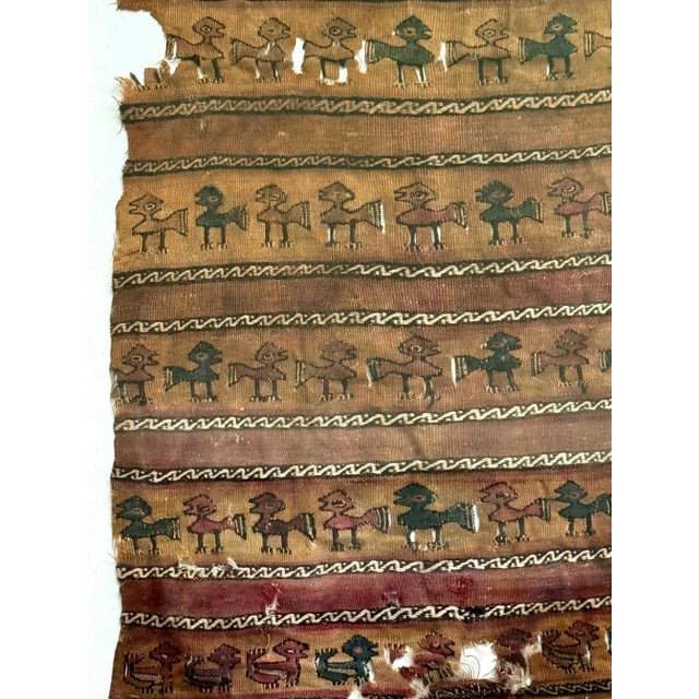 A large fragment of antique pre-Columbia textile panel from Chimu or Chancay culture located in Central and Northern Coast...