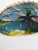 Vintage mid 20th century hand painted sea shell with palm tree and beach scene. A souvenir from Port Angeles Washington,...