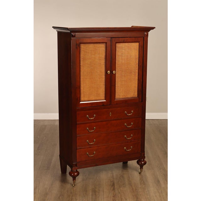 High Quality French Cherry Armoire By Grange Featuring Double Cane Panel Doors Opening To A TV, Media Or Storage Interior...