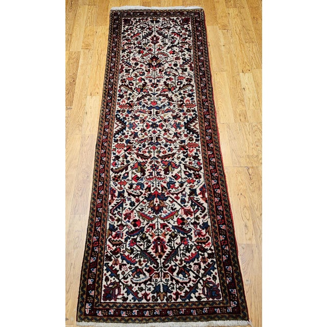 "A beautiful vintage Persian Heriz runner, handwoven in the second quarter of the 20th century with a highly desirable...