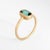 Stylish contemporary green tourmaline ring crafted in 14k yellow gold. Faceted elongated cushion natural green tourmaline...