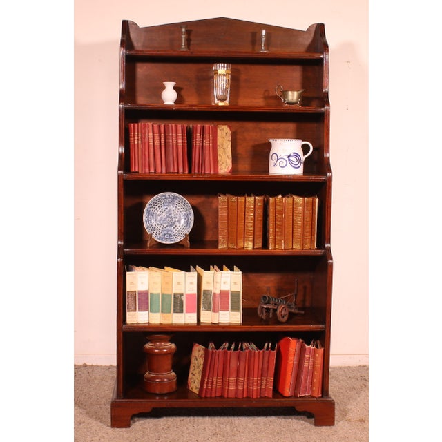 Elegant open mahogany bookcase from the second part of the 19th century from England called waterfall or cascading since...
