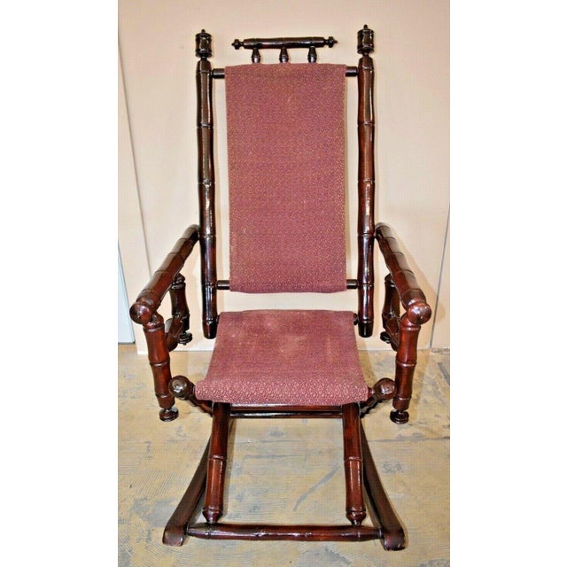 Vintage Faux Bamboo Rocking Chair With Mahogany Finish and Maroon