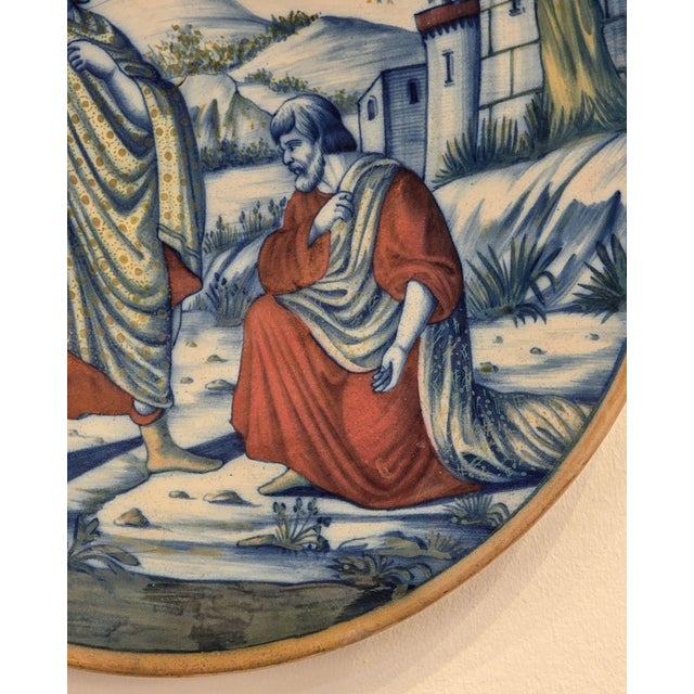 A majolica plate of Paul and the soldiers, Italy circa 1960.