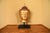 A serene vintage hand-carved, richly gilt decorated Burmese style Buddha head, which is characterized by the sublimely...