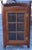 A 19th Century Victorian Oak Corner Cabinet with Glass front door. Functional key present. Measures 30" in width, 17" in...