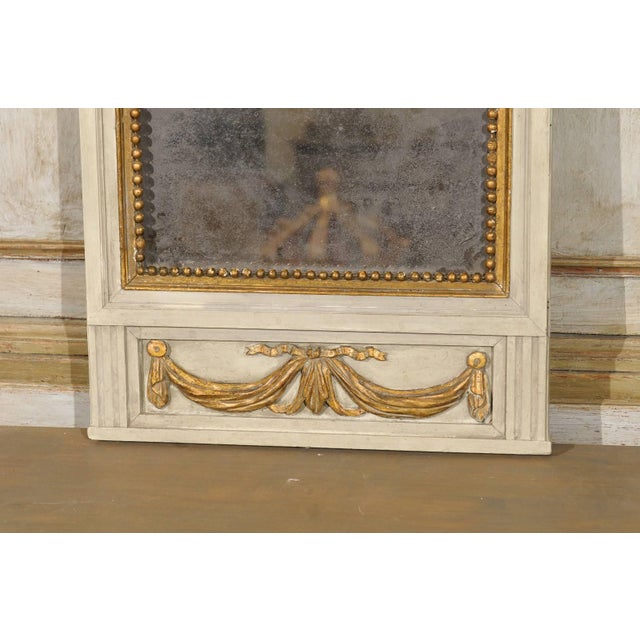 French Mirror in Small Size With Antiqued Glass and Gold Swag Motif on Beige For Sale - Image 4 of 7