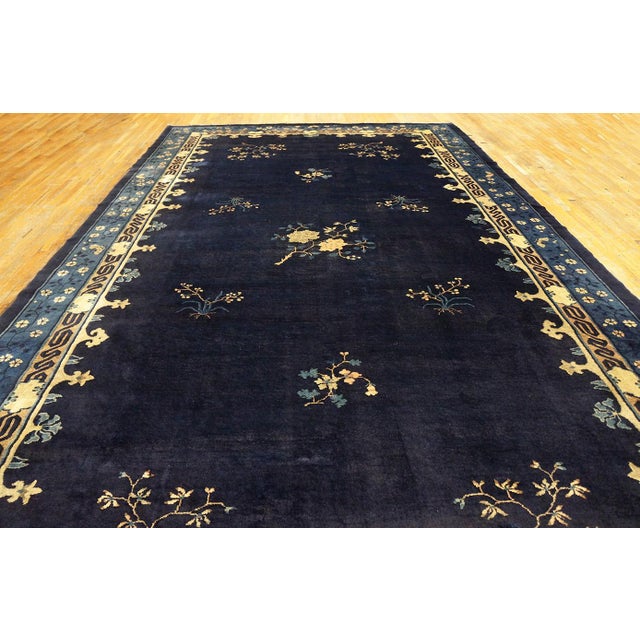Antique Peking Large Room Size Wool Blue Navy Rug, Country of Origin: China, Circa Date: 1920s. This magnificent example...