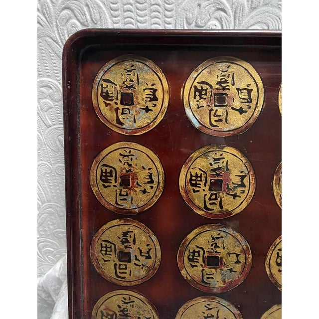 This rare vintage mid century lacquer Vietnam gold coins tray is a unique addition to any collection. The tray features a...