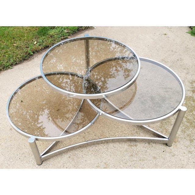 Milo Baughman Tri Level Chrome and Glass Swivel Coffee ... 38 w., 38 d., 15 h.