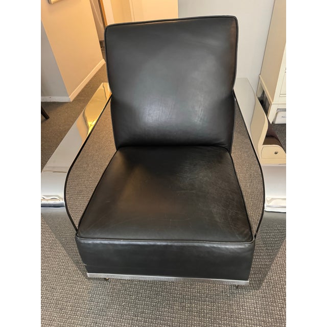 A sophisticated modernist lounge chair designed by Ralph Lauren for Henredon. Known as the "Modern Penthouse" lounge chair...