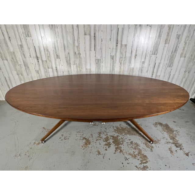 Edward Wormley for dunbar walnut elliptical conference / dining table. Extra long oval table that can be used in a large...