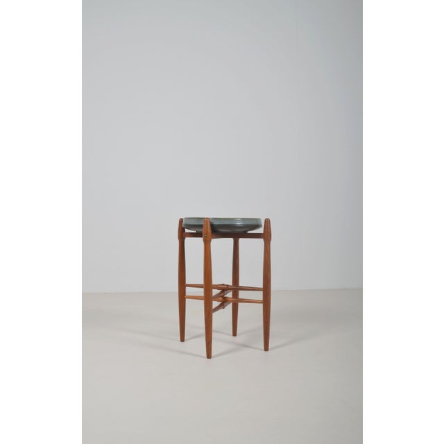 Danish side table with ceramic bowl designed by Poul Hundevad and Arne Basse. This special object was manufactured by...