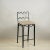 Pair of Méandre™ counter stools by DESIGN FRÈRES® Dark bronze color steel frame. Upholstered firm but comfortable.