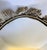 1960s Hollywood Regency Oval Silver-Tone Vanity Mirror With Floral Crest For Sale - Image 4 of 8
