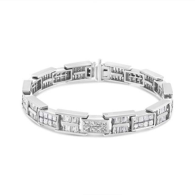 Immerse yourself in the opulence of the 14K White Gold Diamond Panel Link Bracelet, where sophistication meets sheer...