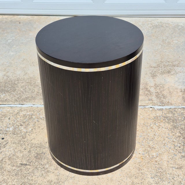 This is a pair of faux bois drum tables that can be used as drink tables or accent tables. They are easily movable and...