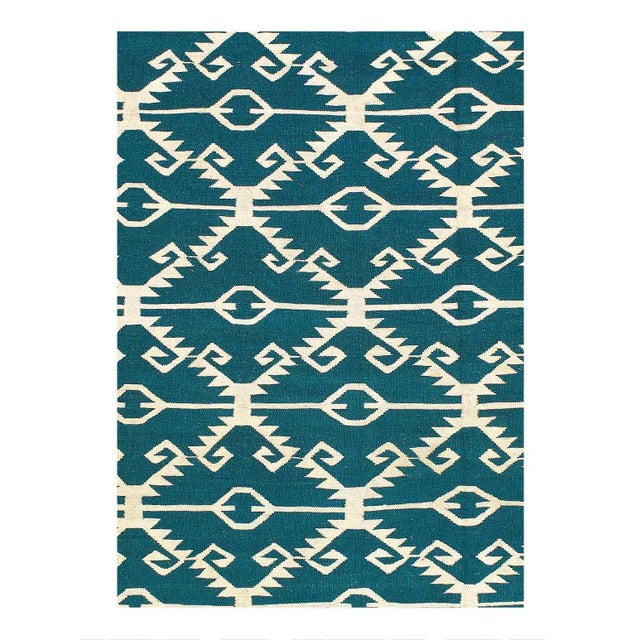 A kilim rug is a flat-woven rug. Kilim rugs are known for their intricate geometric patterns, vibrant colors, and durable...